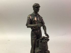 BRONZED RESIN FIGURE OF A GOLFER, ALONG WITH FURTHER FIGURES