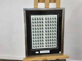 THREE FRAMED SHEETS OF STAMPS,