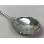 GROUP OF THREE SILVER TEA SPOONS AND A CONTINENTAL SILVER SEVRING SPOON