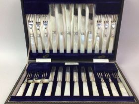 TWO CASED SETS OF MOTHER OF PEARL CUTLERY, AND A CIGAR HUMIDOR