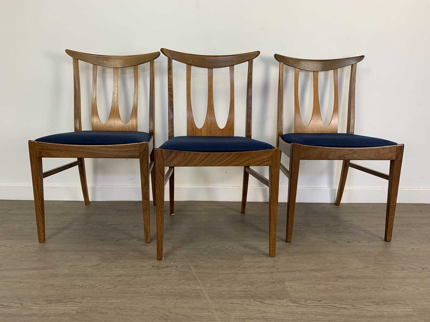 VICTOR WILKINS (BRITISH, 1878-1972) FOR G-PLAN, SET OF SIX 'BRASILIA' TEAK DINING CHAIRS CIRCA 1960-