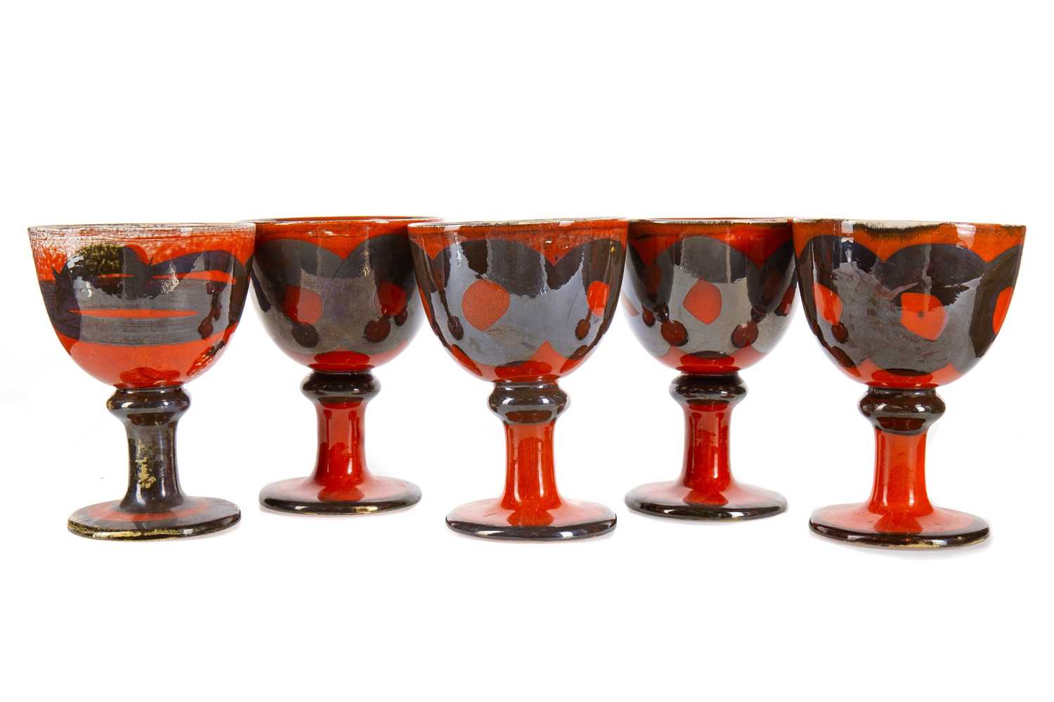 MARGERY CLINTON (SCOTTISH, 1931-2005), SET OF FOUR STUDIO POTTERY LUSTRE GOBLETS