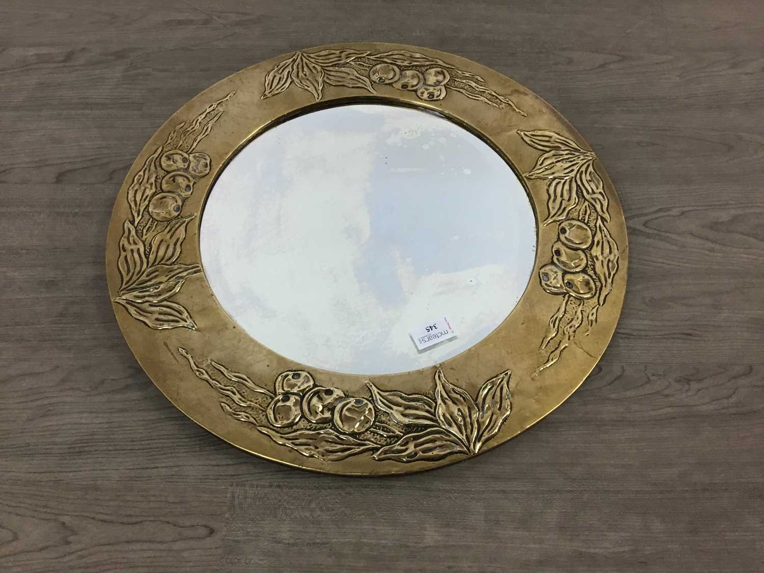 ARTS AND CRAFTS CIRCULAR BRASS WALL MIRROR LATE 19TH / EARLY 20TH CENTURY