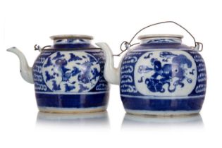 PAIR OF CHINESE PROVINCIAL BLUE AND WHITE TEAPOTS, AND THREE SMALL TEAPOTS