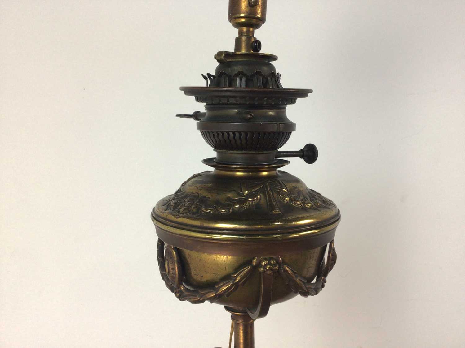 A VICTORIAN BRASS PLATED STANDARD LAMP