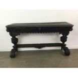 A VICTORIAN EBONISED OAK SIDE TABLE