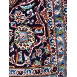 A LARGE PERSIAN KASHAN RUG