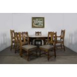 A GOOD OAK HUNT/WAKE TABLE BY NORFOLK CABINET MAKERS AND SET OF EIGHT DINING CHAIRS