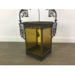 A VICTORIAN BRASS AND FOUR-GLASS HALL LANTERN