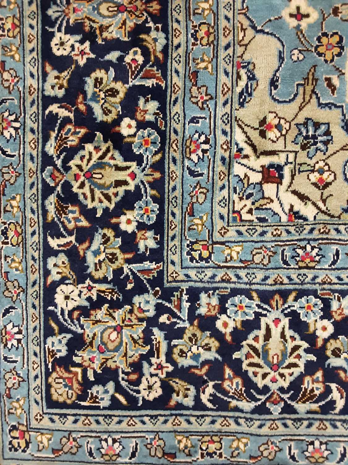 A PERSIAN KASHAN RUG