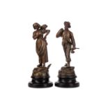 A PAIR OF EARLY 20TH CENTURY BRONZED SPELTER FIGURES AFTER E. FUCHS