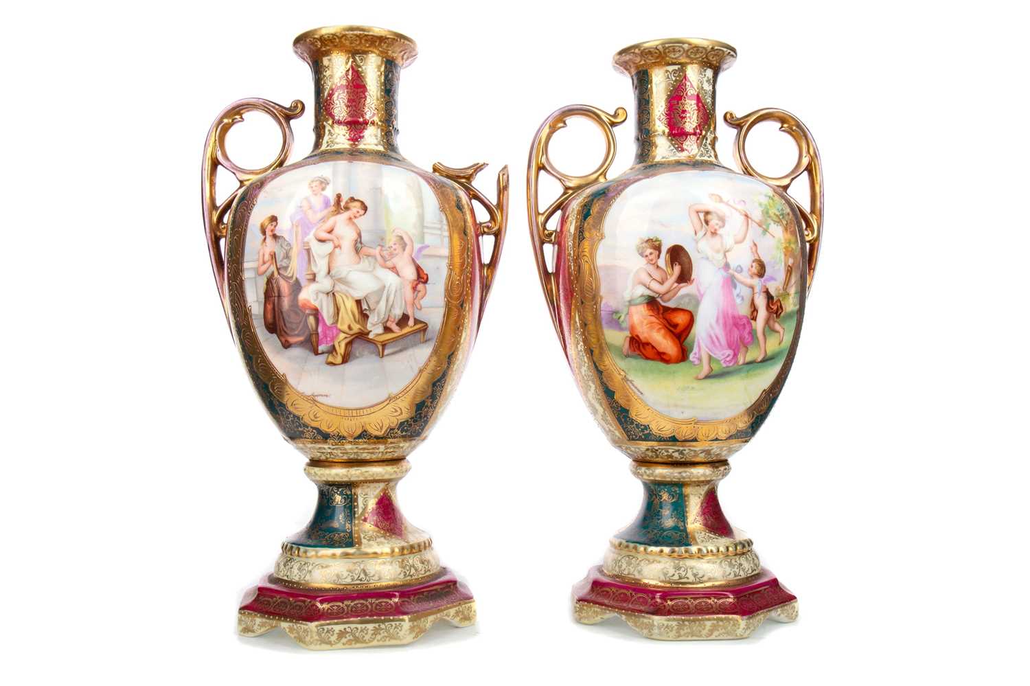 A PAIR OF LATE 19TH/EARLY 20TH CENTURY CONTINENTAL PORCELAIN TWIN HANDLED VASES