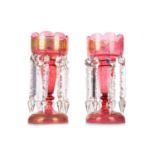 PAIR OF VICTORIAN CRANBERRY GLASS CANDLE LUSTRES, MID-LATE 19TH CENTURY