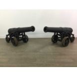 A PAIR OF CAST IRON CANNONS