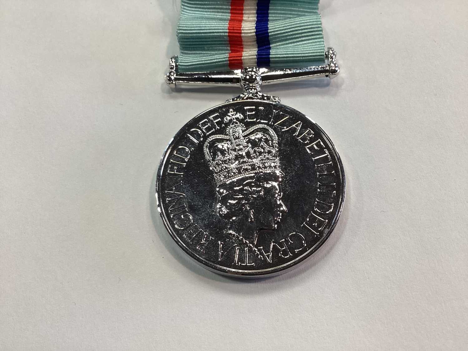 AN ELIZABETH II 1980 RHODESIA MEDAL AND ZIMBABWE INDEPENDENCE MEDAL - Image 2 of 7