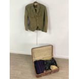 A WWII JACKET, TWO KILTS, MILITARY BADGES AND AN ACME SCOUTS WHISTLE IN A LEATHER SUITCASE