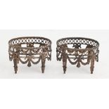 A pair of Dutch oval silver salt cellars, in neo classical style, pierced gallery and festoons, on