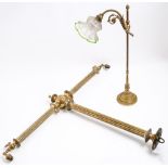 A Victorian brass twin branch gasolier, with reeded upright and branches between beaded collars,