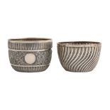 Two Victorian silver sugar bowls,  spirally fluted or chased with scrolling foliage in