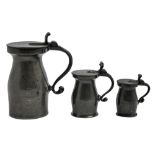 Three French graduated pewter measures, 19th c, one engraved 8oz,  20cm, 13.5 and 10cm h The