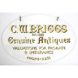 Advertising. A plate glass oval shop window hanging trade sign, second quarter 20th c, lettered in