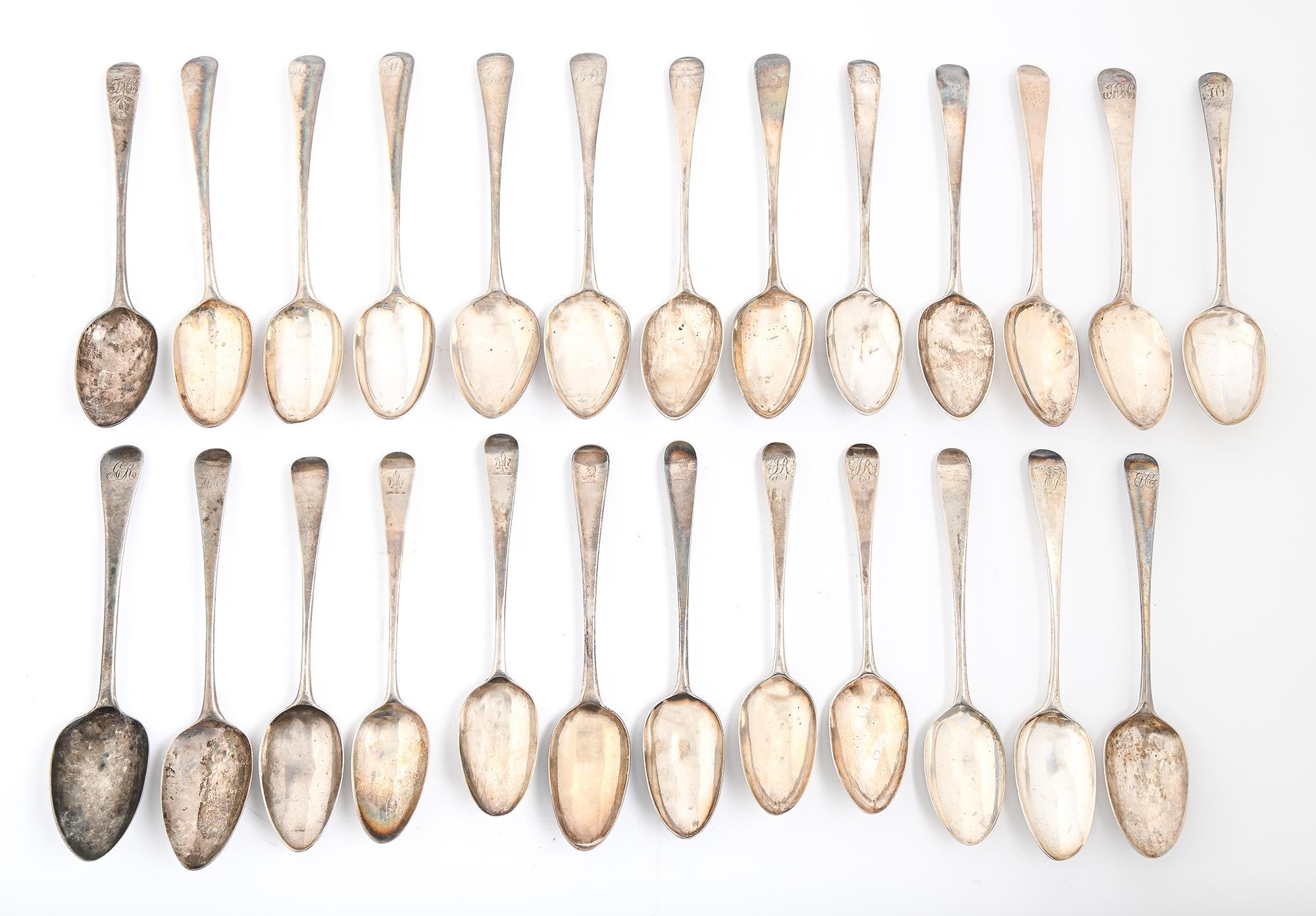 Twenty-four silver tablespoons, all but one George III, Old English pattern, all London, by