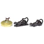 A pair of bronze sculptures of a crouching leopard, early 20th c, one on flat base for mounting,