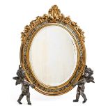 A French gilt and silvered bronze and champleve enamel dressing mirror, c1870, crested by a