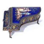 A French musical giltmetal and enamel trinket box in the form of a grand piano, c1900, the lid