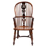 A Victorian yew wood Windsor chair, with elm seat 99cm h The collection of C. W. Briggs (1906-