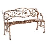 A Victorian rustic cast iron garden seat, seat height 43cm, 130cm l The collection of C. W.