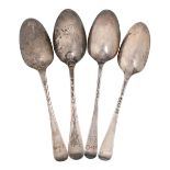 Four George II and early George III silver tablespoons, Hanoverian pattern, with double drop or