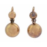 A pair of Victorian gold earrings, of one larger and one smaller sphere, wire loop, 28mm h, 6g The