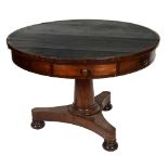 A Victorian mahogany drum table, the black cloth inset top fitted with drawers alternating with