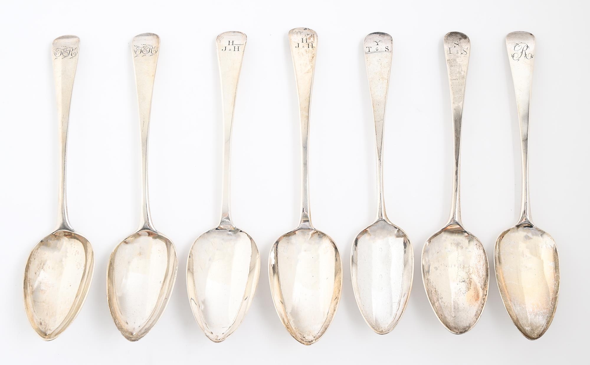 Five George III and two George IV silver tablespoons, Old English pattern, including three