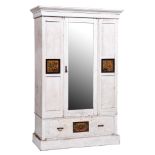 A Victorian Aesthetic painted wardrobe, the panelled doors flanking the mirror with central panel of