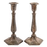 A pair of George V silver candlesticks, on hexagonal foot, nozzles, 26cm h, by Adolph Scott,