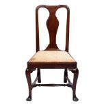 A George II mahogany chair, with moulded back and spoon splat, on cabriole forelegs with turned