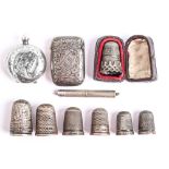 Eight silver thimbles, late 19th and early 20th c, a Victorian silver vesta case, Birmingham 1892, a