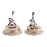 A pair of Edwardian silver wishbone novelty place stands, 46mm h, by Levi & Salaman, Birmingham 1904