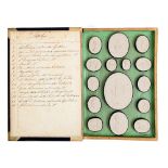 A set of fifteen Italian Grand Tour plaster casts of classical intaglios in book shaped box, early