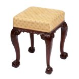 A mahogany dressing stool, the legs 18th c, carved with acanthus leaves and claw and ball feet, 46cm