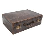 A crocodile hide dressing case, early 20th c, the lid lettered in gilt G F-J, brass lock, 35 x