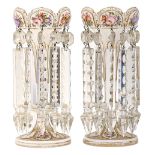 A pair of Bohemian overlay glass lustres, c1870, overlaid in white and painted with flowers on a