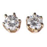 A pair of diamond ear studs, in gold, 4mm diam, marked 18c, 1g Good condition