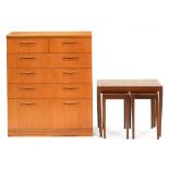 A teak chest of drawers, 1970s, 108cm h; 86cm l and a contemporary stained wood nest of three tables