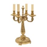 A gilt lacquered brass candelabrum of four lights, in Louis XVI style, 45cm h Good condition