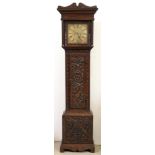 An oak eight day longcase clock, John Garfield fecit, 18th century, the brass dial with matted