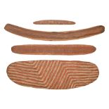 An Australian aboriginal wood shield, boomerang and two other items, mid 20th c, the front of the