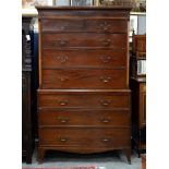 A mahogany and line inlaid chest on chest, in George III style, late 19th century, the sides of